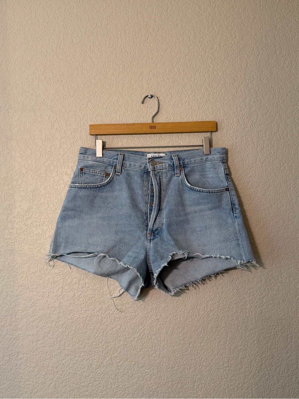 Agolde Light Wash Frayed Hem Denim Shorts